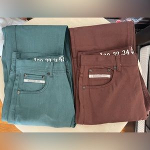 2 Akademiks brand jeans.